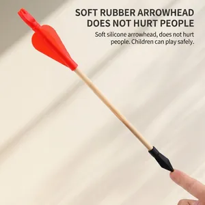 Traditional wooden arrow for kids game with soft safety tip and red silicone fletching