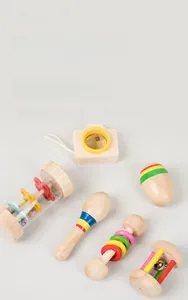 Detail showing smooth polished edges and burr-free texture on wooden baby rattles