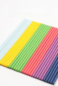 Close-up of smooth, colorful wooden counting sticks for Montessori sensory development