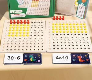 Detail view of Montessori wooden multiplication and division boards with cards