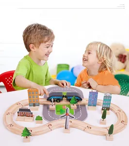 Detailed view of 46pcs wooden train track set with buildings and scenic accessories