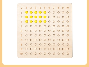 Detailed top view of a Montessori multiplication board with wooden holes and yellow beads