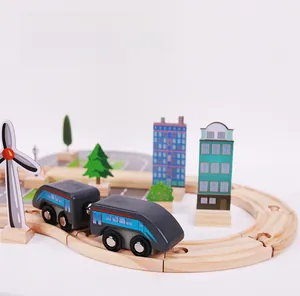 Detail view of magnetic wooden train engine on curved track with wind turbine props