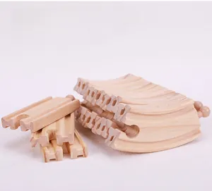 Close-up of natural wooden train tracks with smooth edges for child safety and assembly
