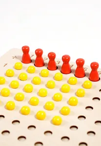Macro view of wooden Montessori division board with colorful counting pegs for kids