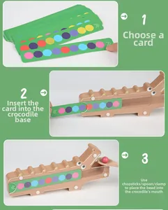 Macro view of wooden crocodile toy with color matching cards and sensory beads for learning