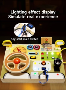 Detail of wooden Montessori steering wheel toy featuring LED lights and ignition key