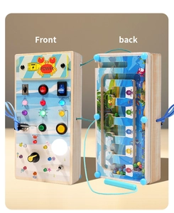 Detail of wooden busy board featuring LED switches and sensory color sorting track