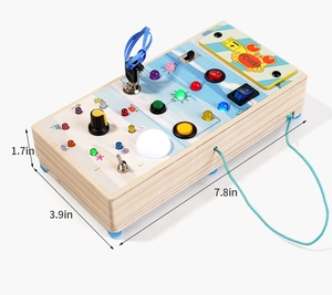 Detail view of Montessori wooden busy board with switches, LED lights and 7.8 inch size dimensions