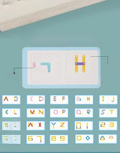 Educational wooden pegboard cards showing alphabet letters G, H and geometric patterns