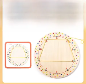 Detail view of wooden geometric threading board with numbered pegs and pattern guide card
