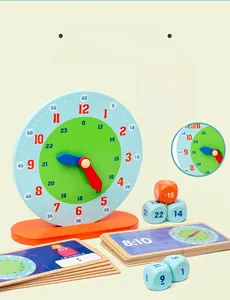 Close-up of wooden teaching clock with colorful time dice and learning cards