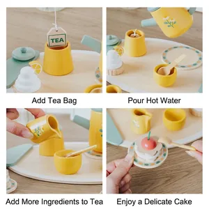 Set da tè pomeridiano in legno per bambini con teiera gialla e tazze con margherite