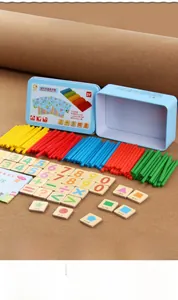 Detail of wooden counting sticks and magnetic number tiles in a blue tin storage box