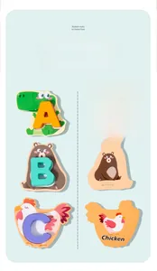 Close-up of double-sided wooden alphabet puzzles featuring ABC animal illustrations