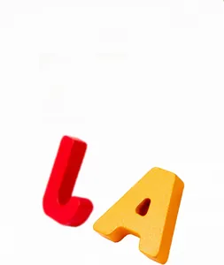 Detail of large wooden alphabet blocks with smooth rounded edges and child-safe paint