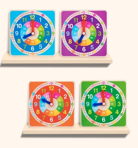 Macro detail of wooden educational clocks with colorful dials and manual rotating hands