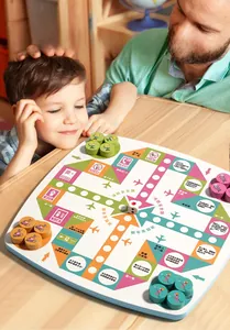 Father and son playing the magnetic wooden flying chess game for kids brain training