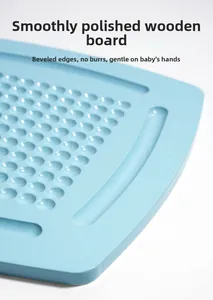 Detail of light blue wooden game board with smooth polished surface and rounded edges