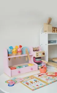 Detailed wooden ice cream toy set with pink display stand and colorful treats for kids