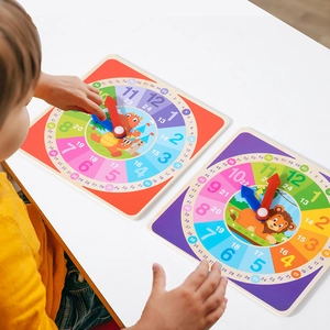 Wooden kids teaching clock set with colorful dinosaur and lion designs for learning time