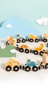 Detail of magnetic wooden animal train cars with animal prints and functional black wheels