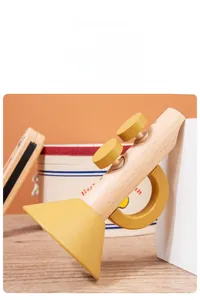 Close-up of polished wooden trumpet toy with smooth edges for toddler early education