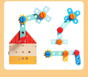 Detail of wooden busy board toy with colorful screws, gears and assembling parts