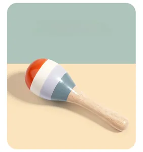 Close-up of colorful wooden sand hammer toy made of natural rubber wood for infants