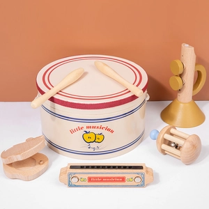Wooden musical instrument set for kids including drum, trumpet, and harmonica toys