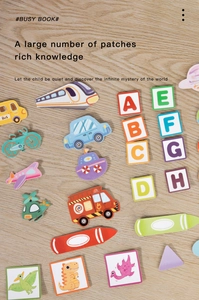 Detail of colorful interactive educational busy book pieces with vehicles and dinosaurs