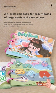 Macro detail of Montessori busy book showing interactive vehicle stickers and A4 pages