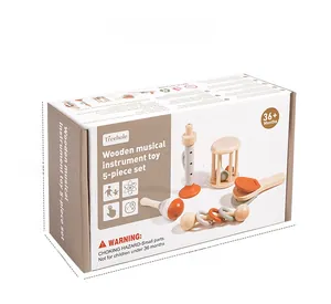 Detailed packaging view of 5-piece wooden baby instrument set showing box dimensions