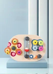 Detail of 4-in-1 wooden busy board with colorful beads and spinners for baby motor skills