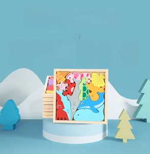 Detail of colorful marine animal wooden puzzle featuring whale and dolphin shapes on a stand