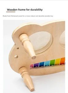 Detail of durable thickened wooden base and colorful rainbow metal keys of musical toy