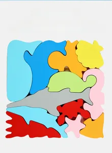 Macro detail of colorful wooden sea animal puzzle pieces with eco-friendly water paint