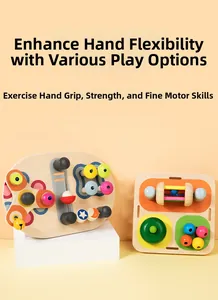 Detail of wooden sensory busy board with colorful gears and beads for motor skills