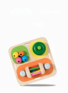 Detail of Montessori wooden busy board showing smooth edges and colorful sensory beads