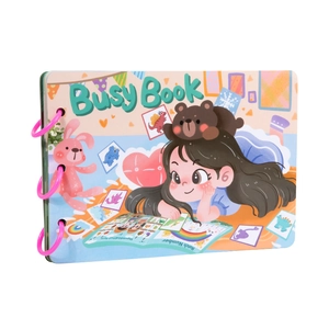 Montessori busy book for kids with pink binders and colorful cartoon cover illustrations