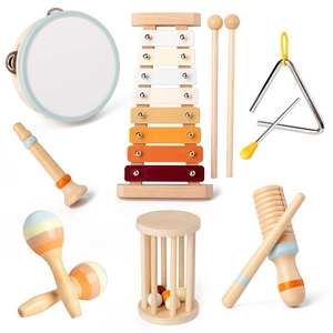 Educational wooden musical instrument set for children with xylophone, drum, and tambourine