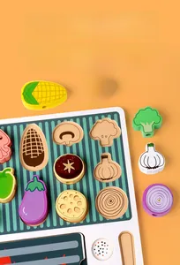 Detailed view of colorful wooden vegetable blocks including corn and eggplant on board