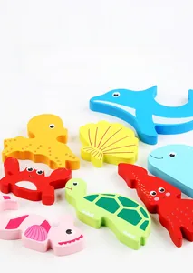 Detail of wooden ocean animal puzzle showing smooth edges and colorful heat transfer prints