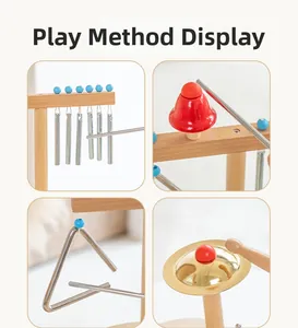 Detail view of children's wooden musical set including wind chimes, bells, and triangle