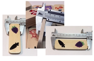 Macro view of wooden Montessori blocks measuring thickness with a digital caliper tool