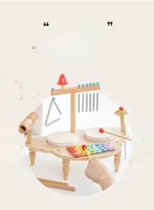 Detail of multi-functional wooden musical toy with colorful xylophone and drum for kids