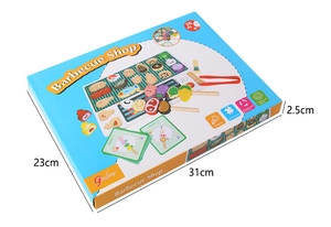 Close-up of wooden BBQ playset packaging showing 31x23x2.5cm dimensions and toy contents