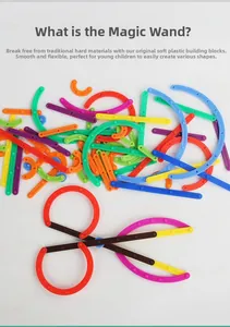 Detail of colorful soft plastic building blocks forming a creative scissor shape