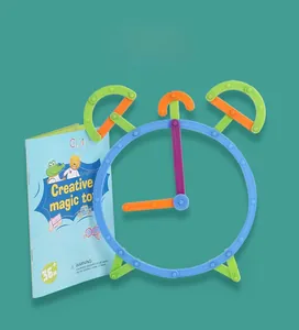 DIY creative clock model built with colorful building blocks and a manual