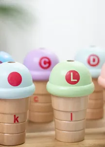 Detail of wooden ice cream alphabet blocks with macaron colors and smooth finish